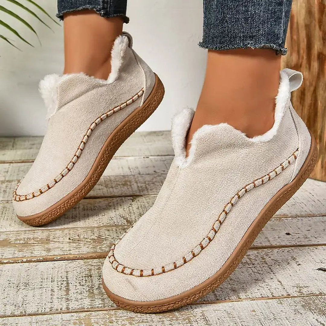 Woman wearing the Rylee women's boots, back view