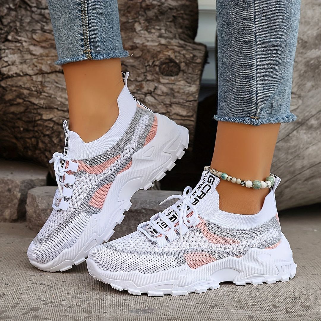 Woman wearing the Sable women's sneakers, front view