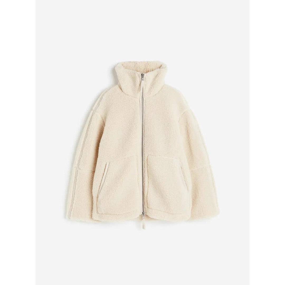 Woman wearing the Sadie women's oversized zip-up jacket, model view