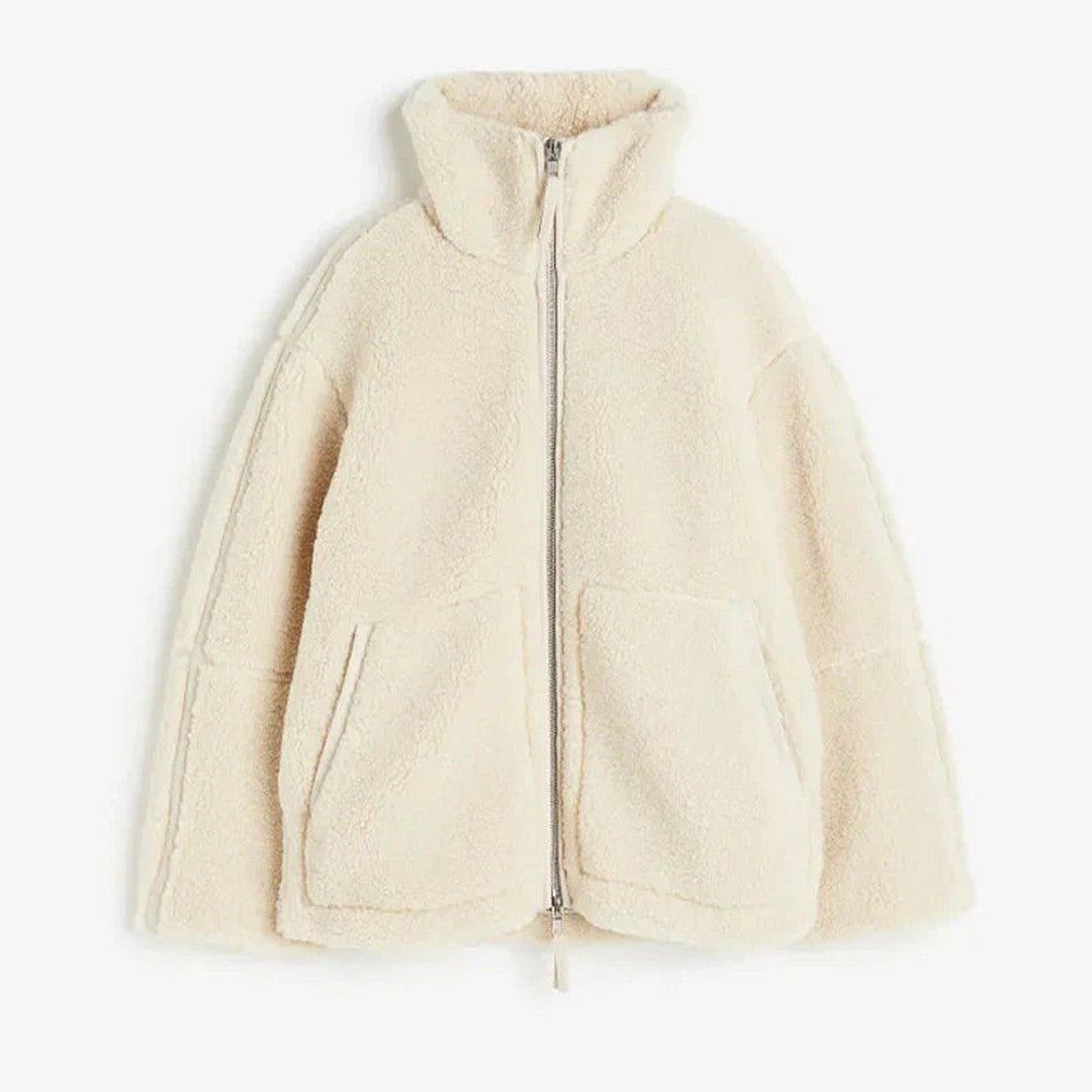 Woman wearing the Sanne women's wool jacket, back view
