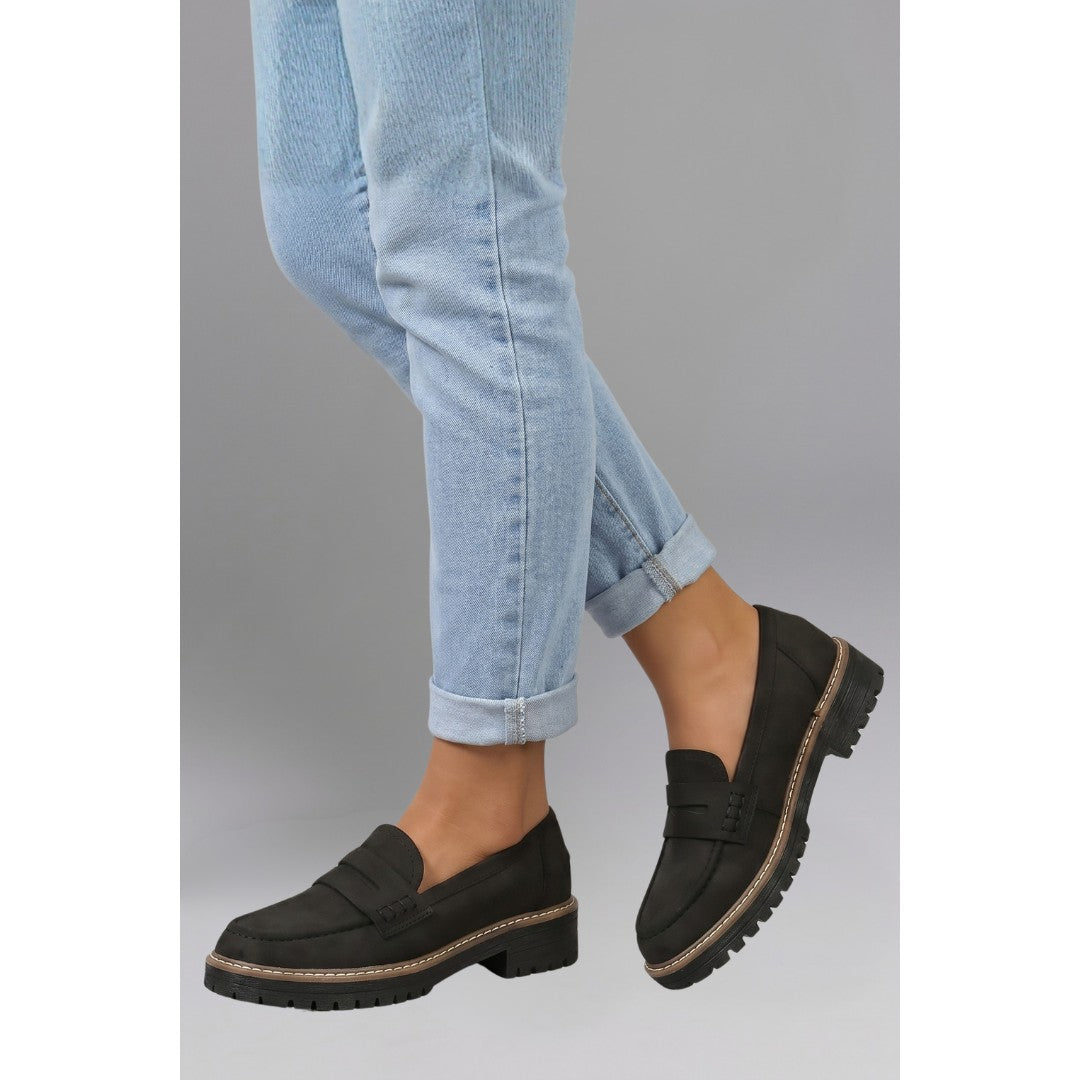 Woman wearing the Santiago women's leather loafers, flatlay view