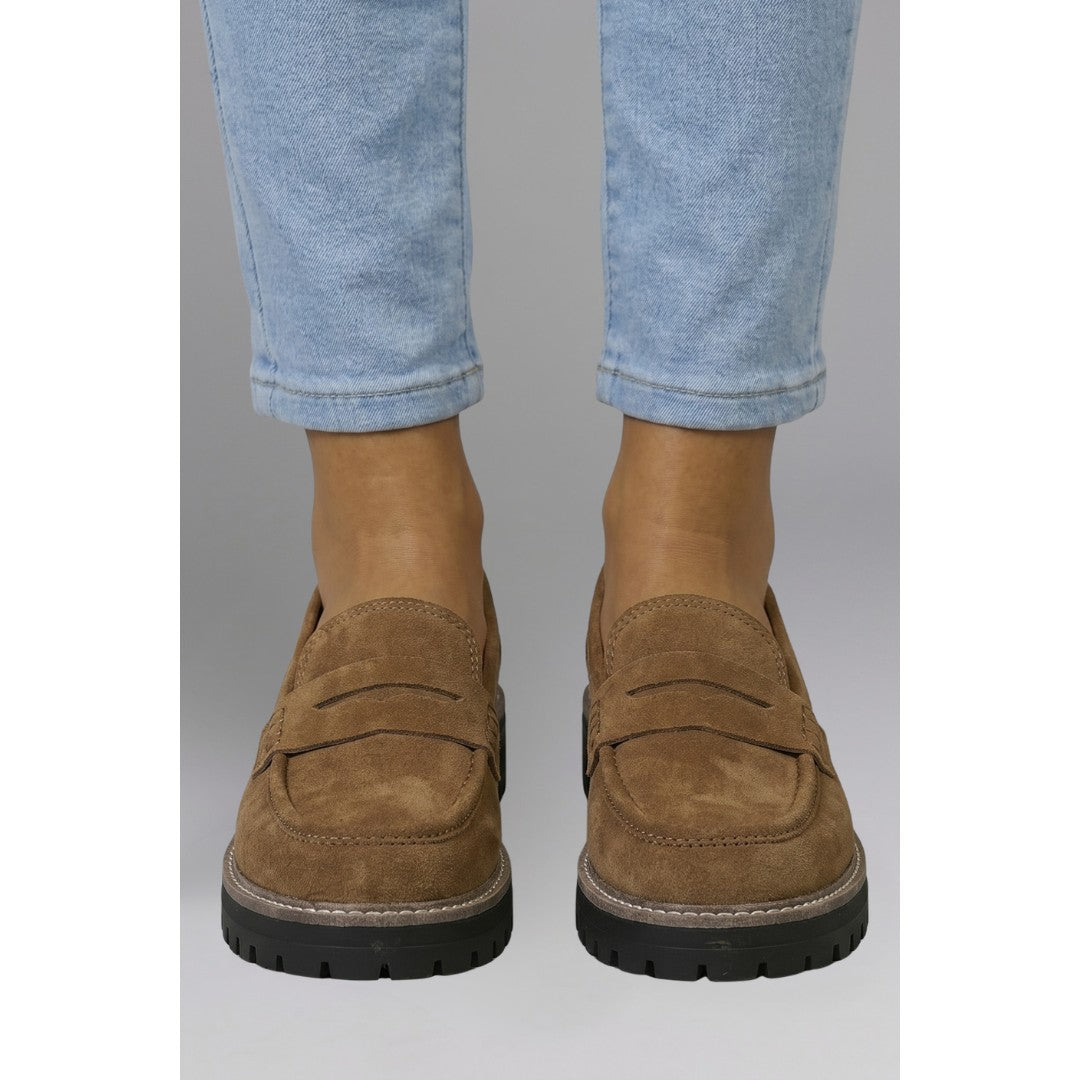 Woman wearing the Santiago women's leather loafers, side view