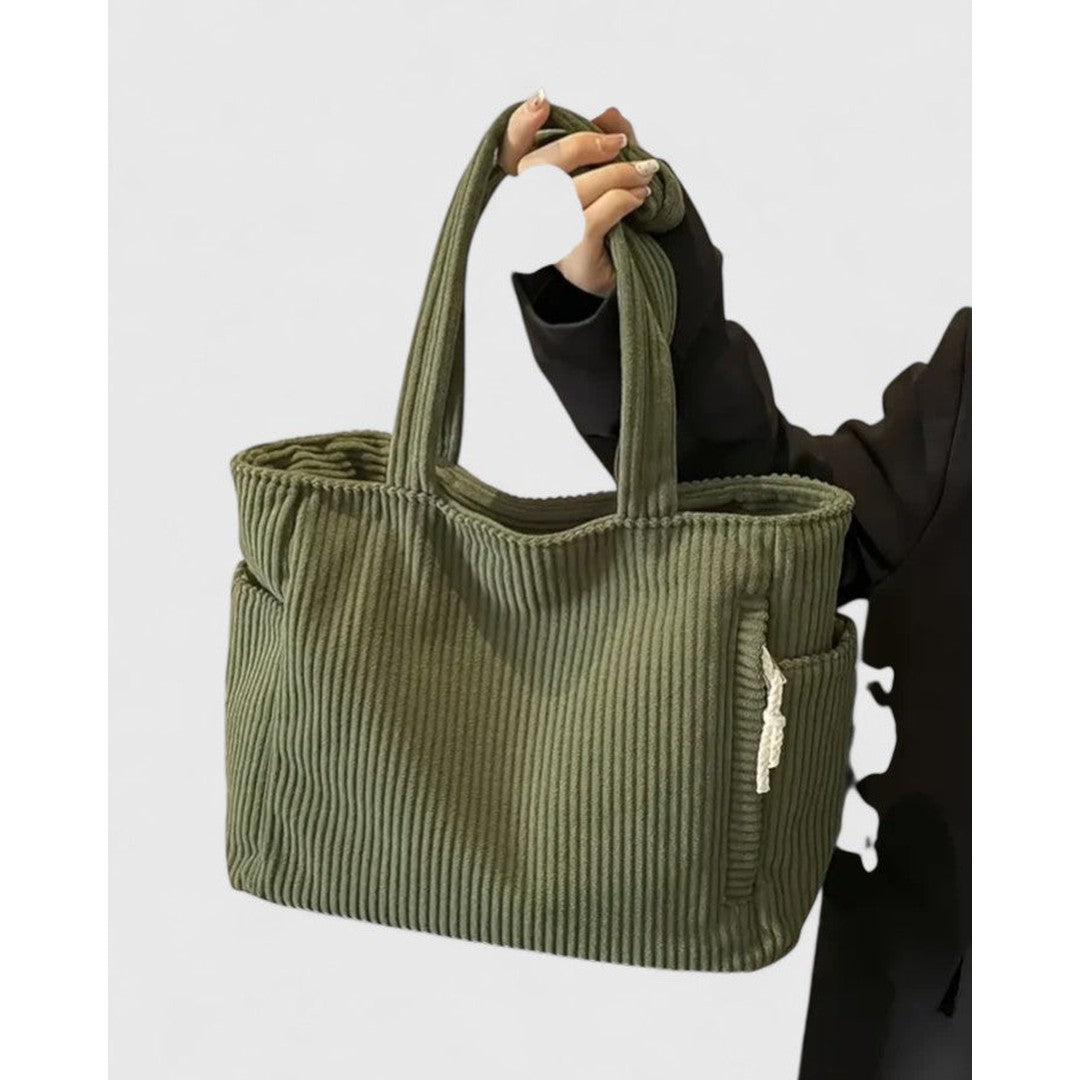 Woman wearing the Sarah women's bag, front view