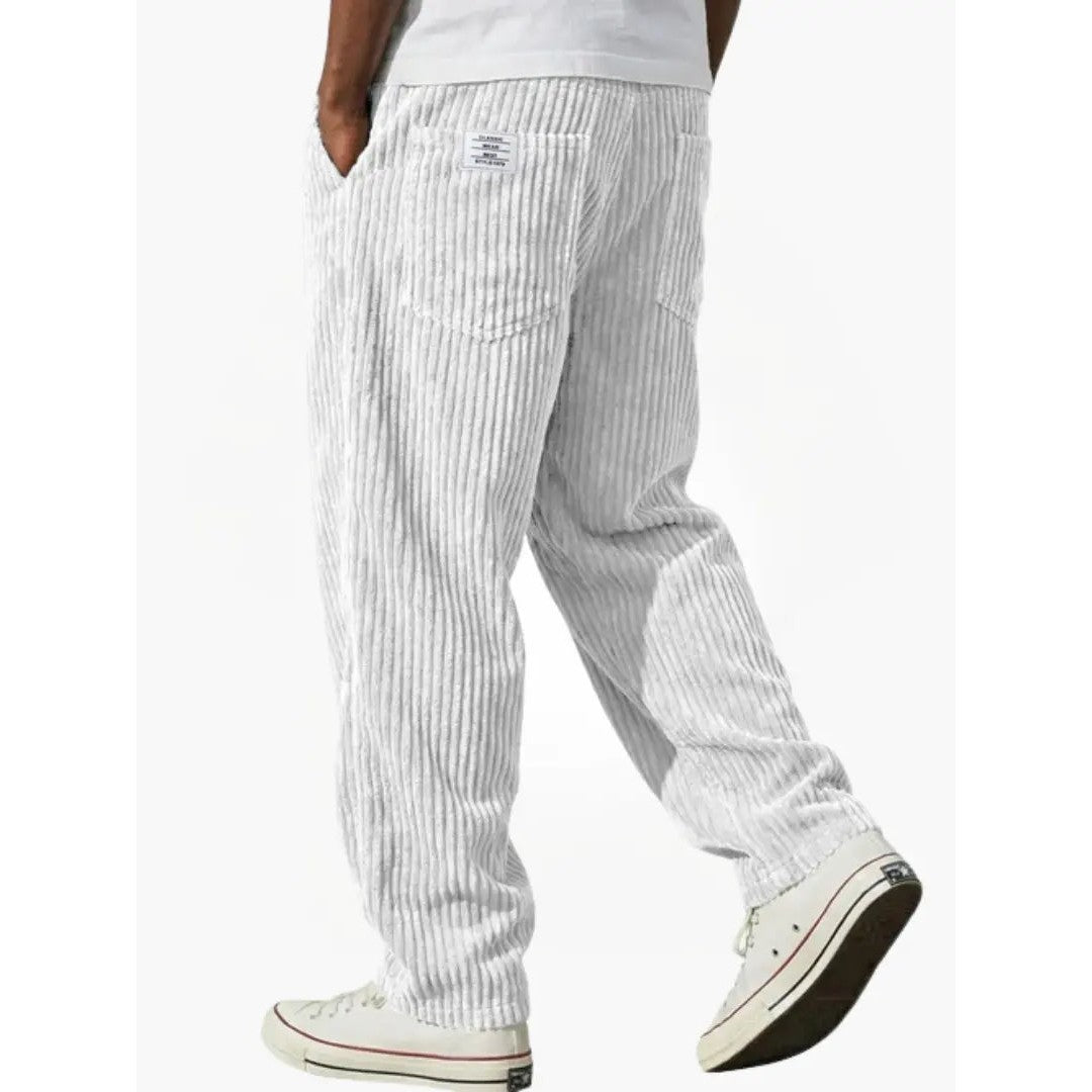 Man wearing the Sawyer men's relaxed corduroy drawstring pants, flatlay view