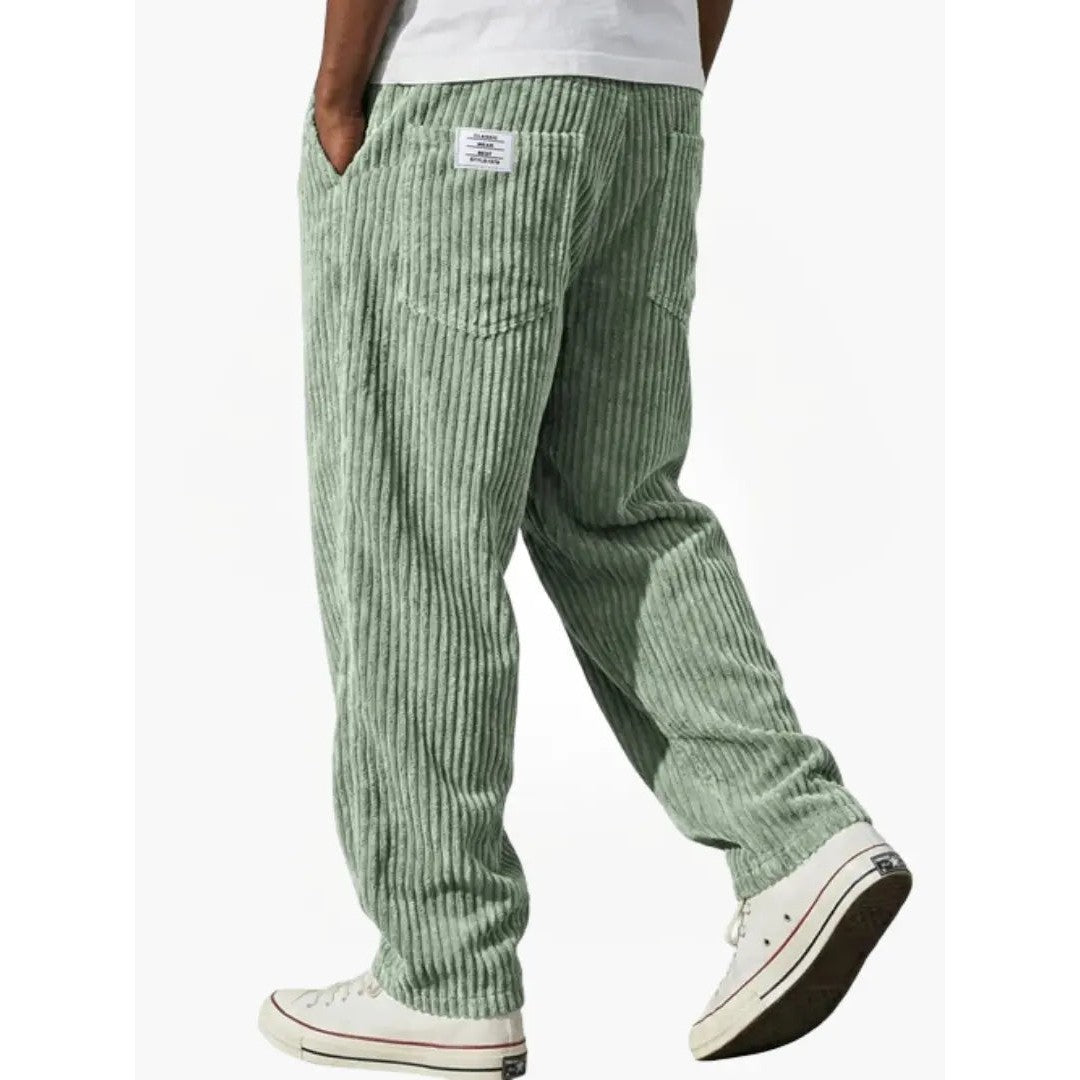 Man wearing the Sawyer men's relaxed corduroy drawstring pants, model view