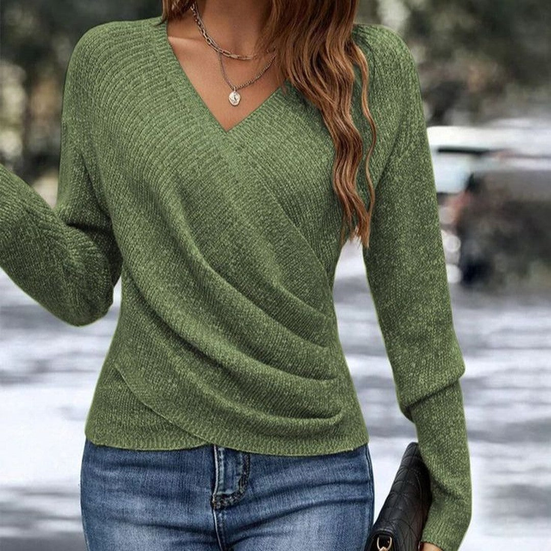 Woman wearing the Serenity women's v-neck elegant sweater, detail view