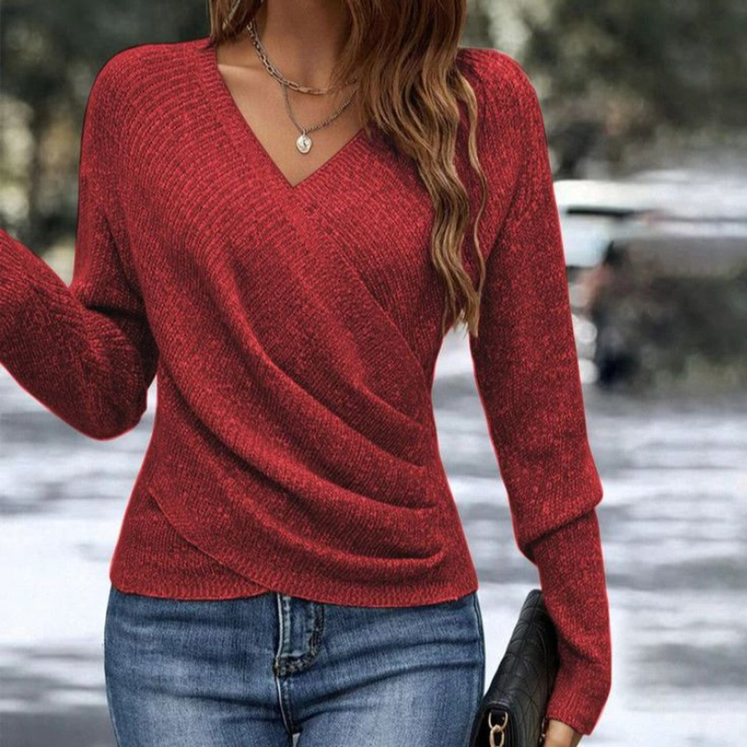 Woman wearing the Serenity women's v-neck elegant sweater, side view
