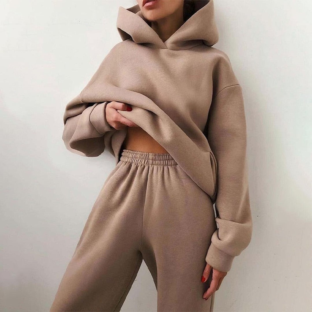 Woman wearing the Sienna women's wide-leg hooded sweatshirt, flatlay view