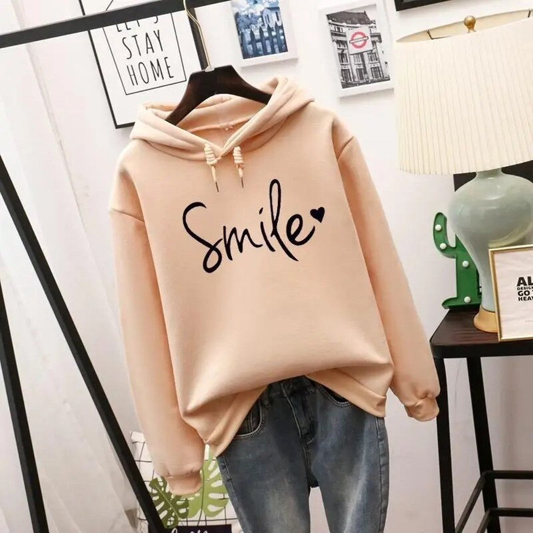 Woman wearing the Sigrid women's hooded sweater, front view