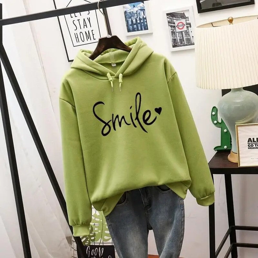 Woman wearing the Sigrid women's hooded sweater, model view