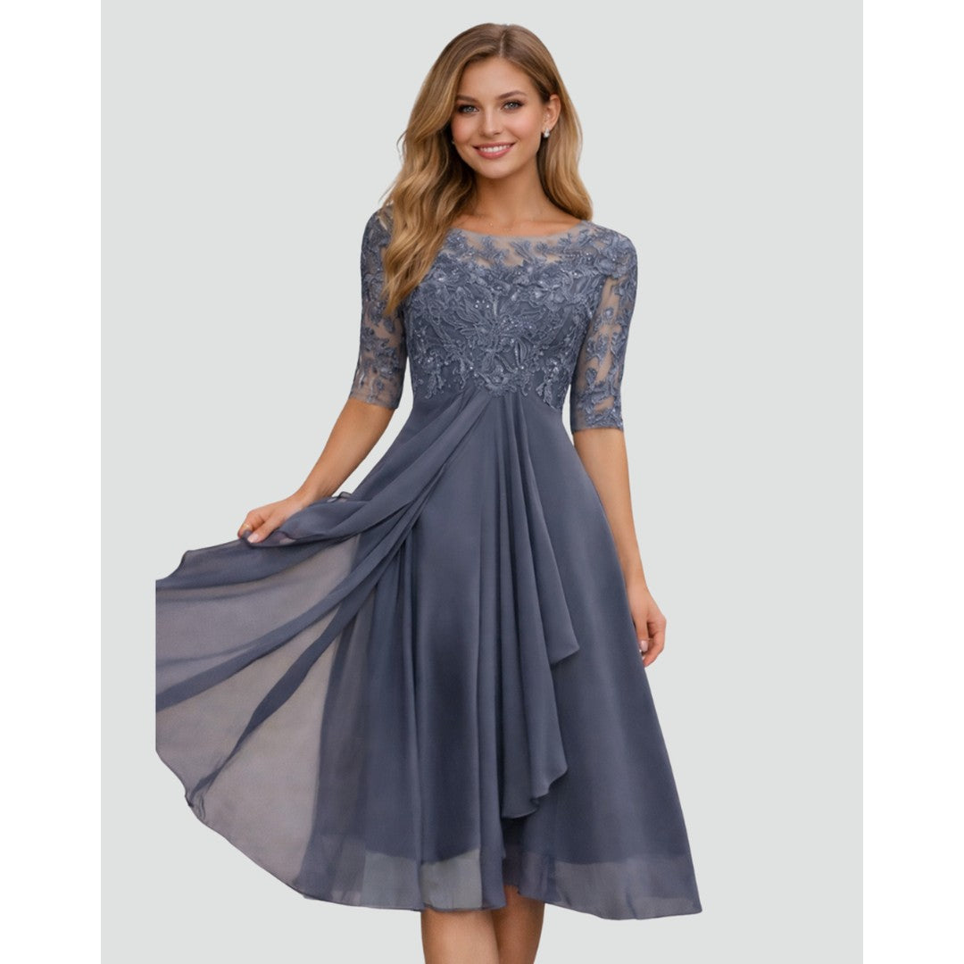 Woman wearing the Sloane women's midi lace elegant dress, model view