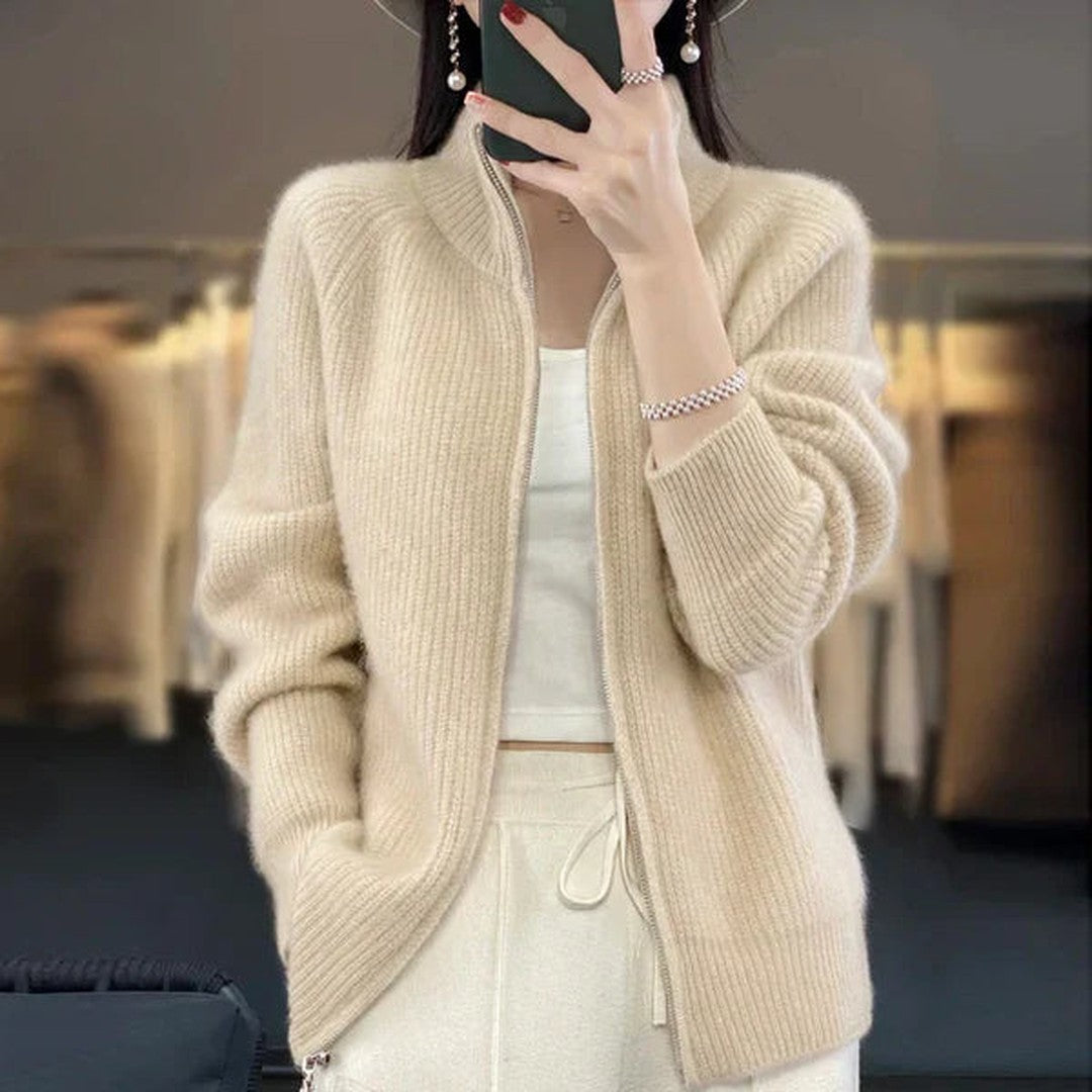 Woman wearing the Sverre women's collared zip-up cardigan, flatlay view