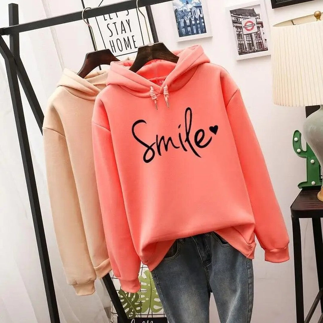 Woman wearing the Talia women's hooded hoodie, side view