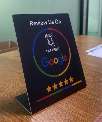 NFC tap-to-review card on a counter stand - product photo 7