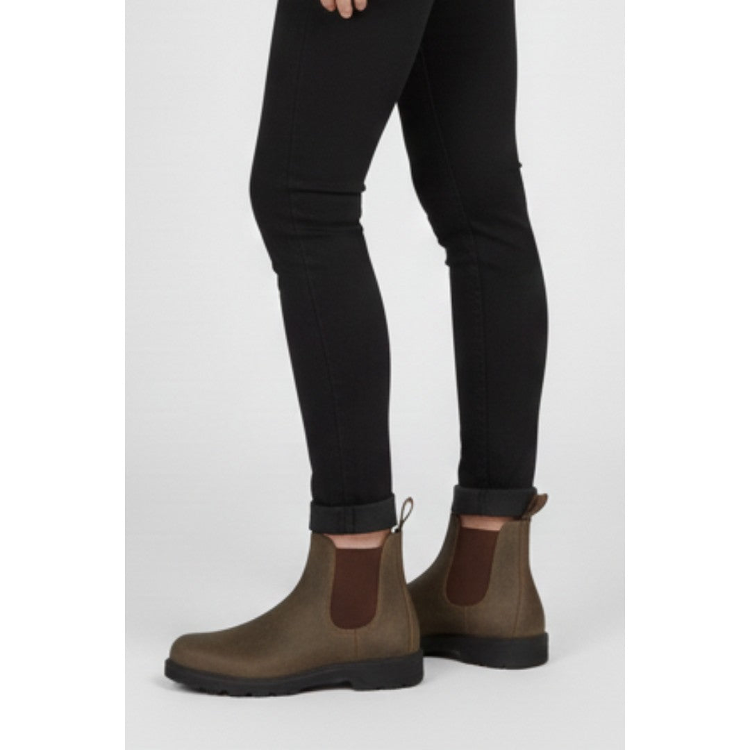 Woman wearing the Thorne women's boots, model view