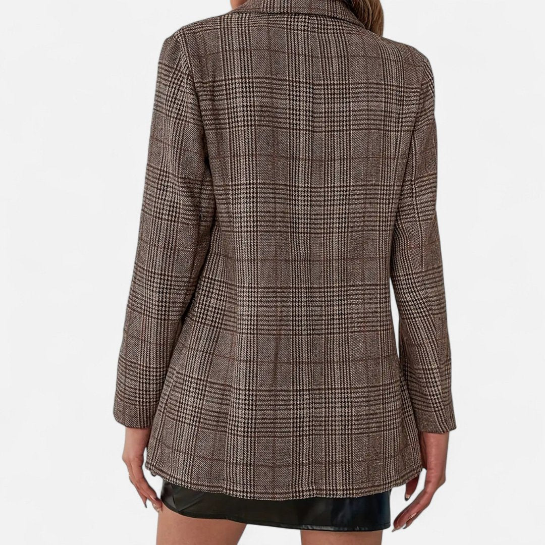 Woman wearing the Ursuline women's plaid blazer, detail view