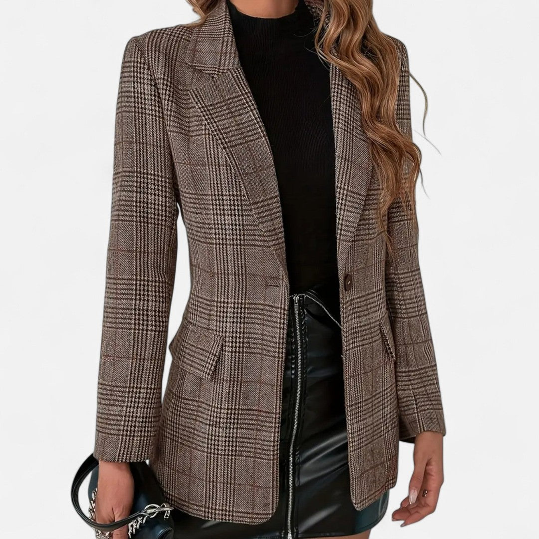 Woman wearing the Ursuline women's plaid blazer, front view