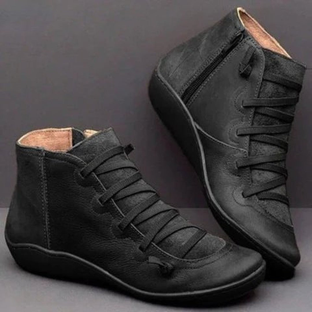 Woman wearing the Vada women's boots, side view