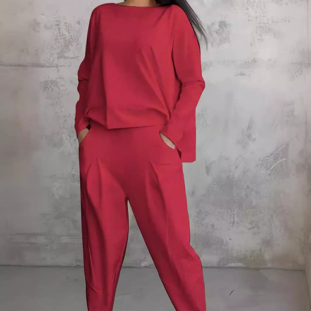 Woman wearing the Veda women's wide-leg dress, front view