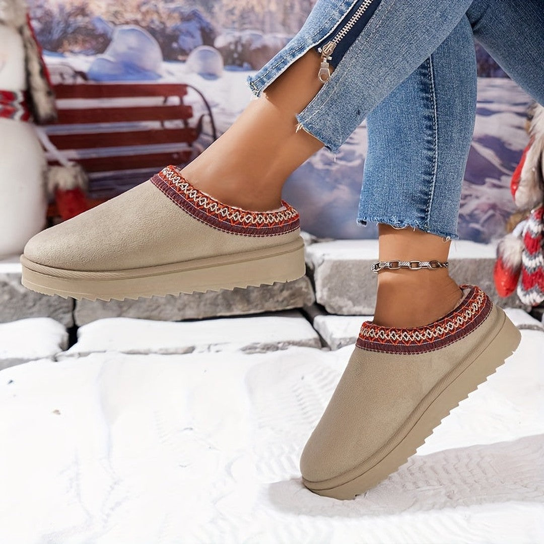 Woman wearing the Vera women's boots, flatlay view
