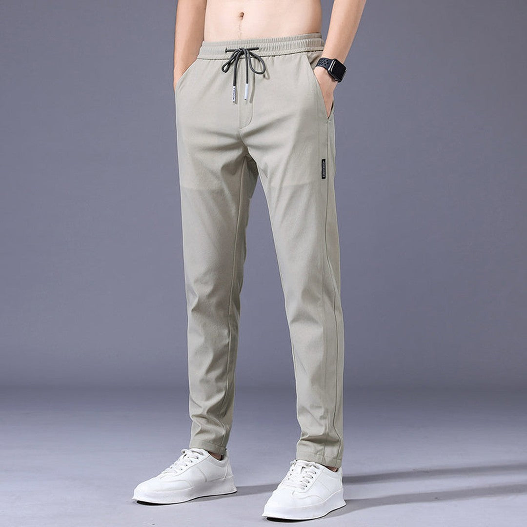 Man wearing the Vincent men's stretch pants, back view