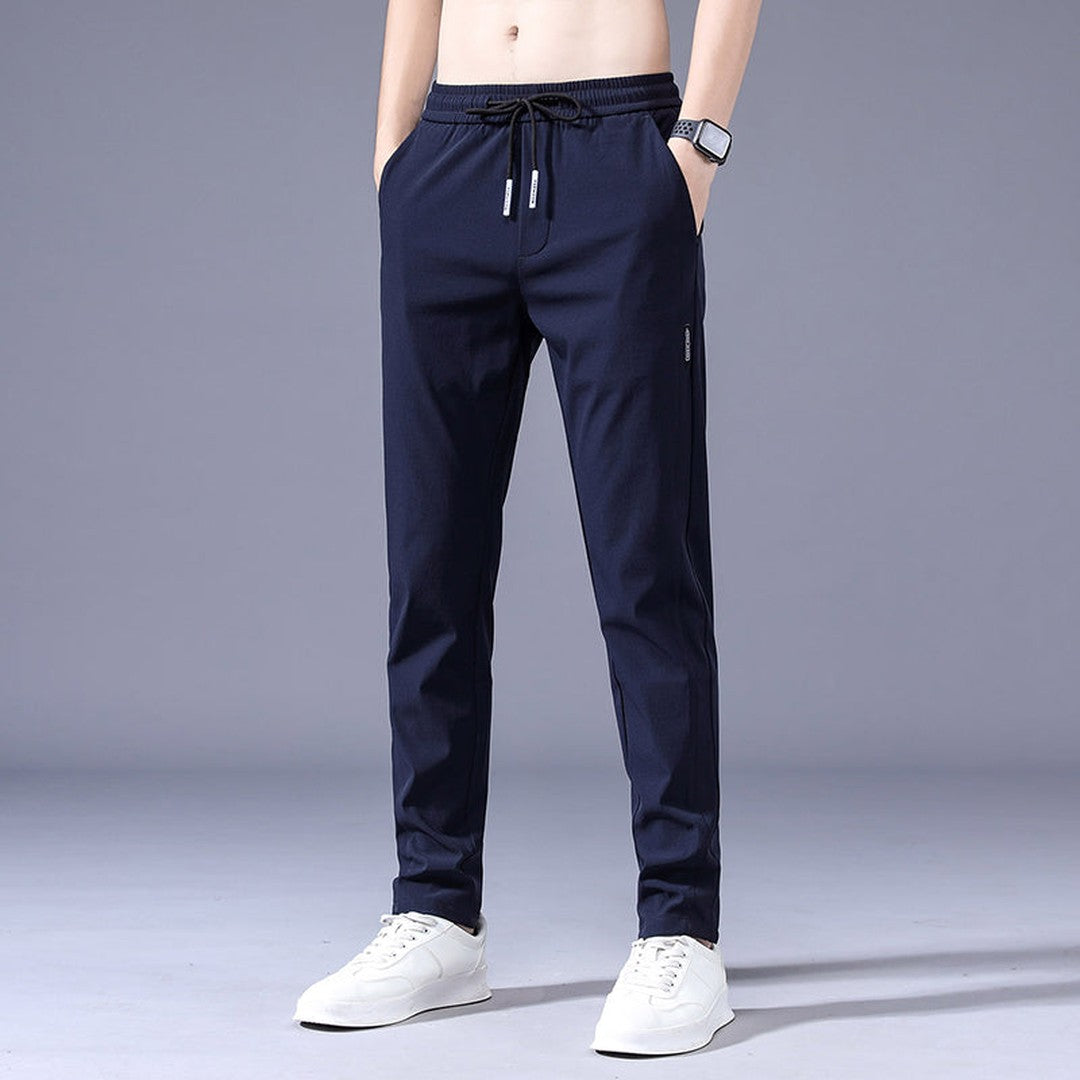 Man wearing the Vincent men's stretch pants, model view