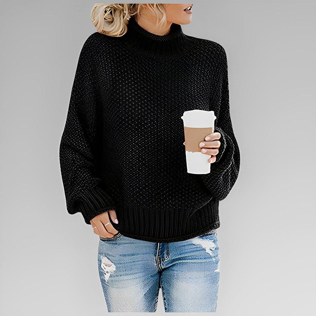 Woman wearing the Vivienne women's sweater, side view