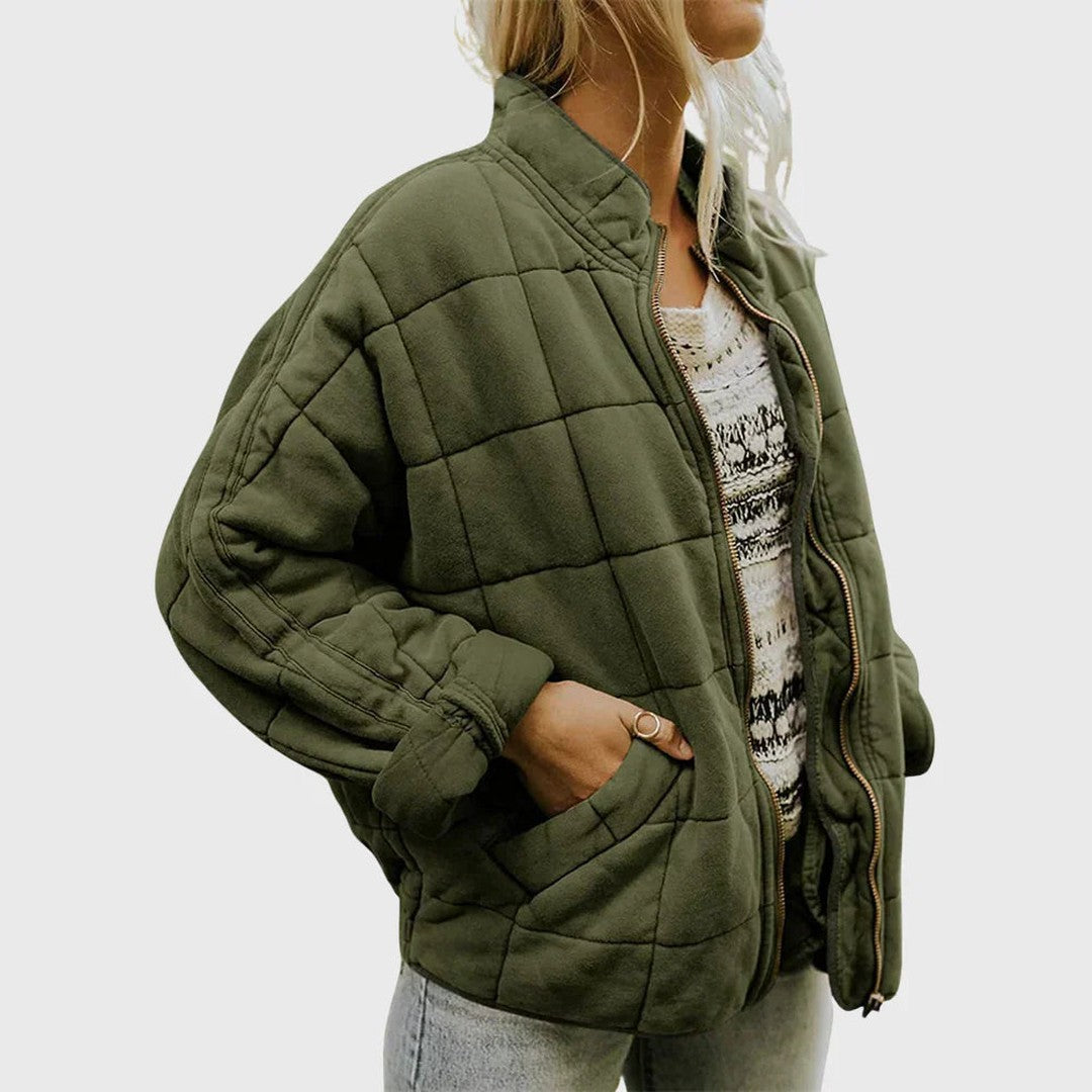 Man wearing the Wolfgang men's quilted jacket, front view