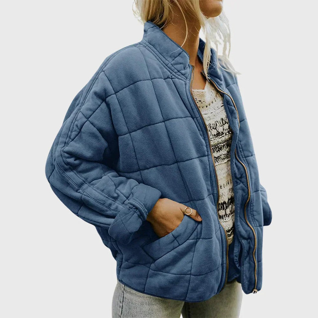 Man wearing the Wolfgang men's quilted jacket, model view