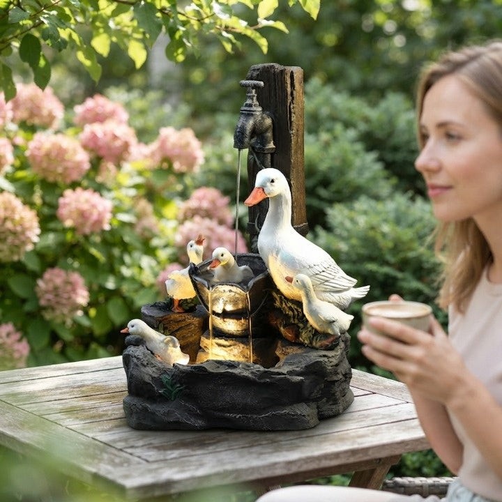 Solar table garden fountain with an animal figure and LED light - product photo 3