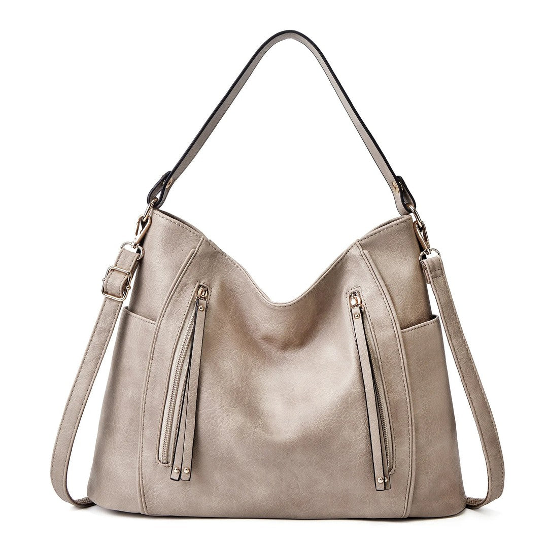Woman wearing the Ximena women's elegant bag, front view