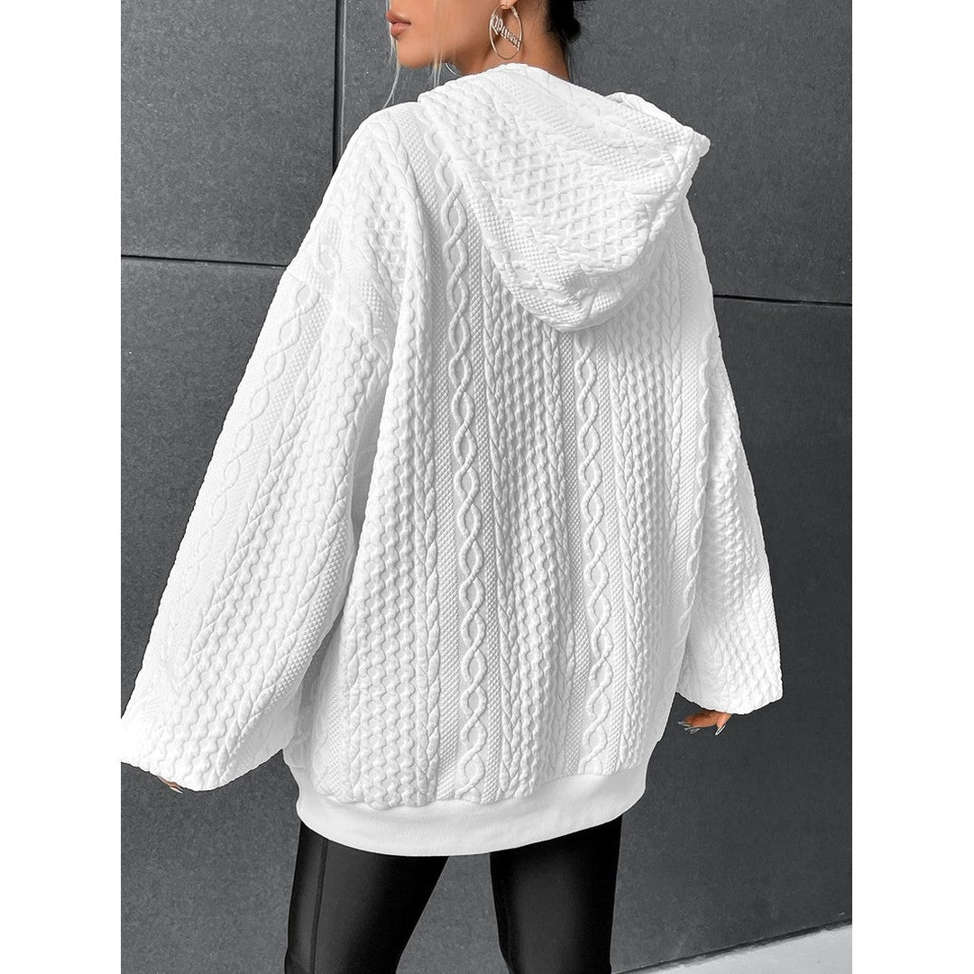 Woman wearing the Yara women's hooded sweater, front view
