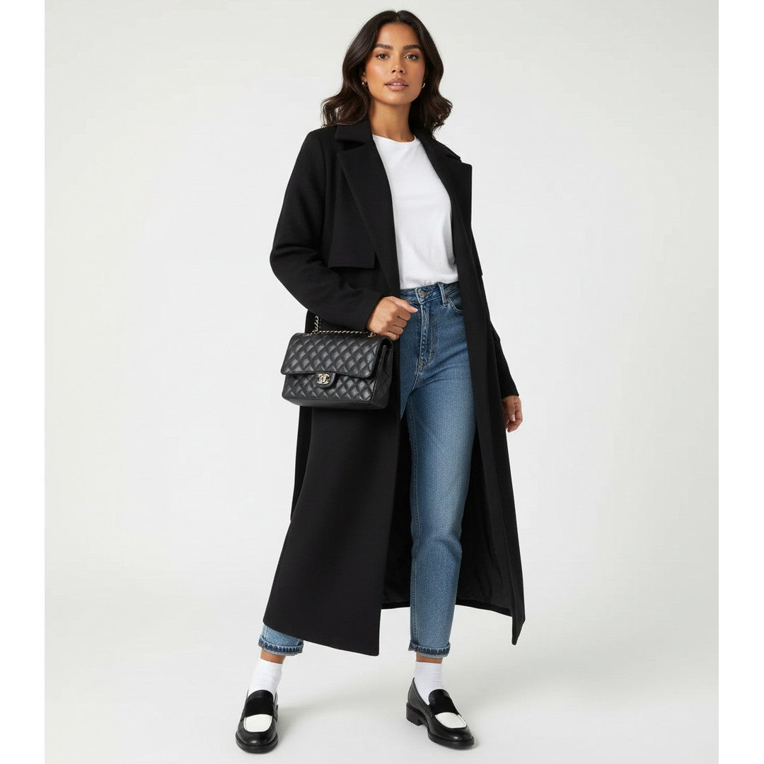 Woman wearing the Ylva women's long-sleeve coat, 11 view