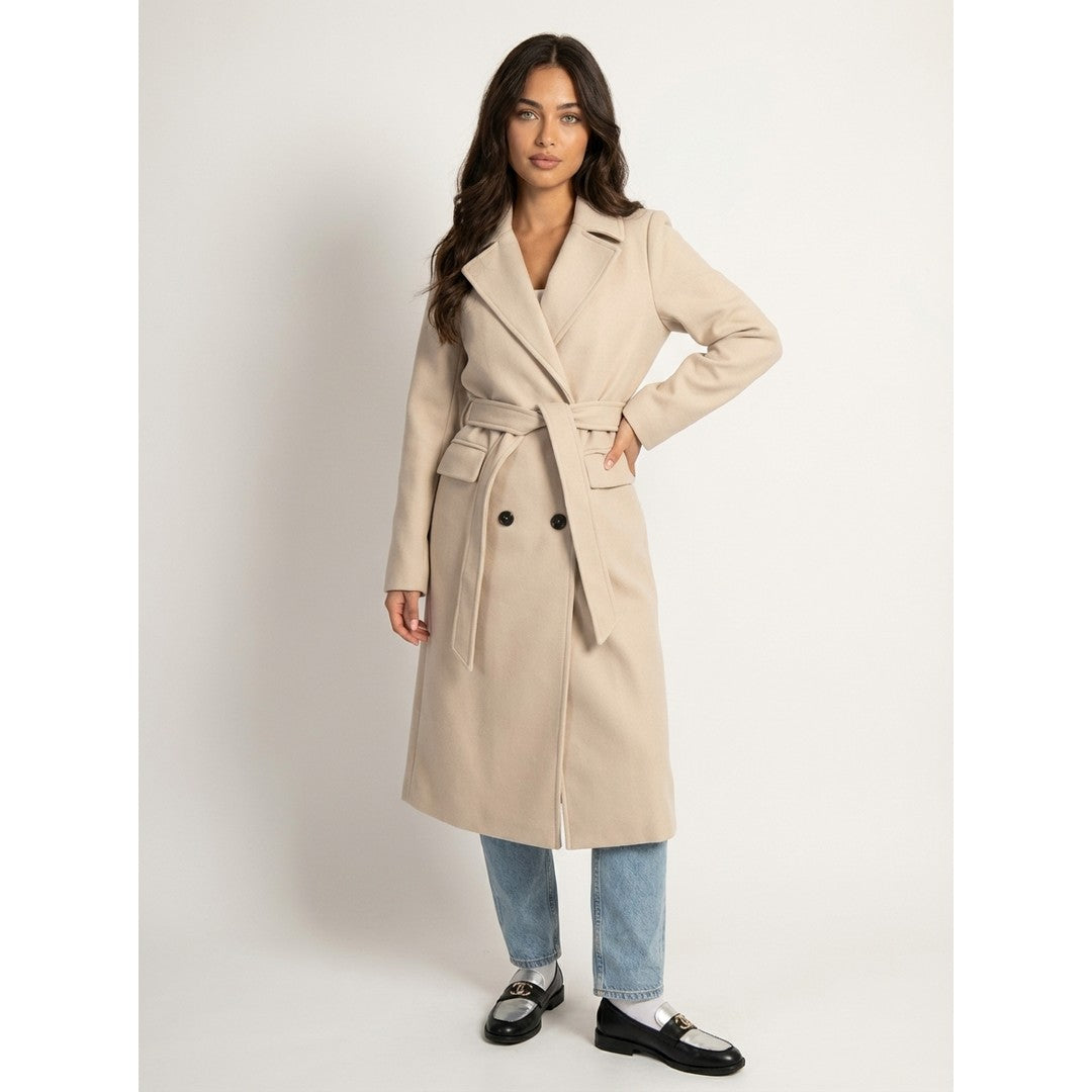 Woman wearing the Ylva women's long-sleeve coat, back view